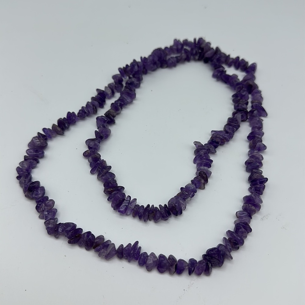 Womens purple single strand purple stoneā necklace